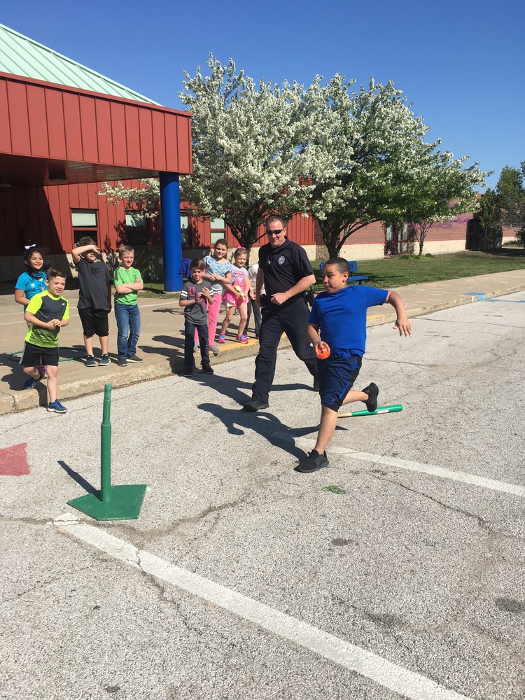 SCHOOL DISTRICT SECURITY GUARD PLAYING IN PE