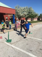 SCHOOL DISTRICT SECURITY GUARD PLAYING IN PE